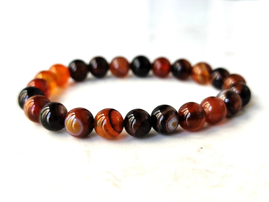 8 mm gestreifter Traum-Achat orange-braun Armband